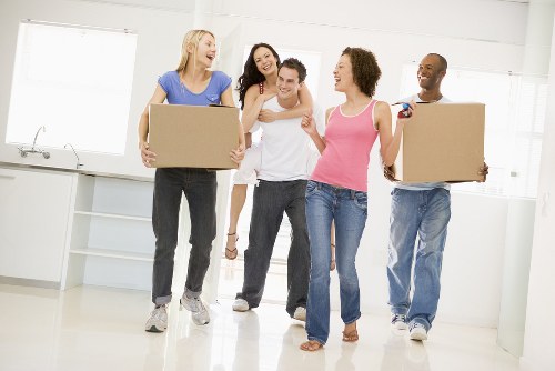 Removal team moving household items in Golders Green