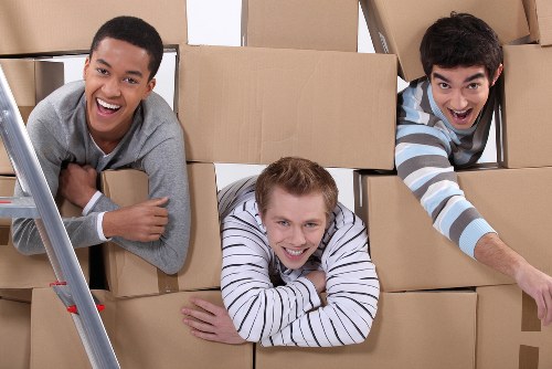 Fragile household items wrapped for a move in Goldersgreen