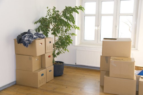 Local Goldersgreen movers loading boxes and furniture for a same day relocation